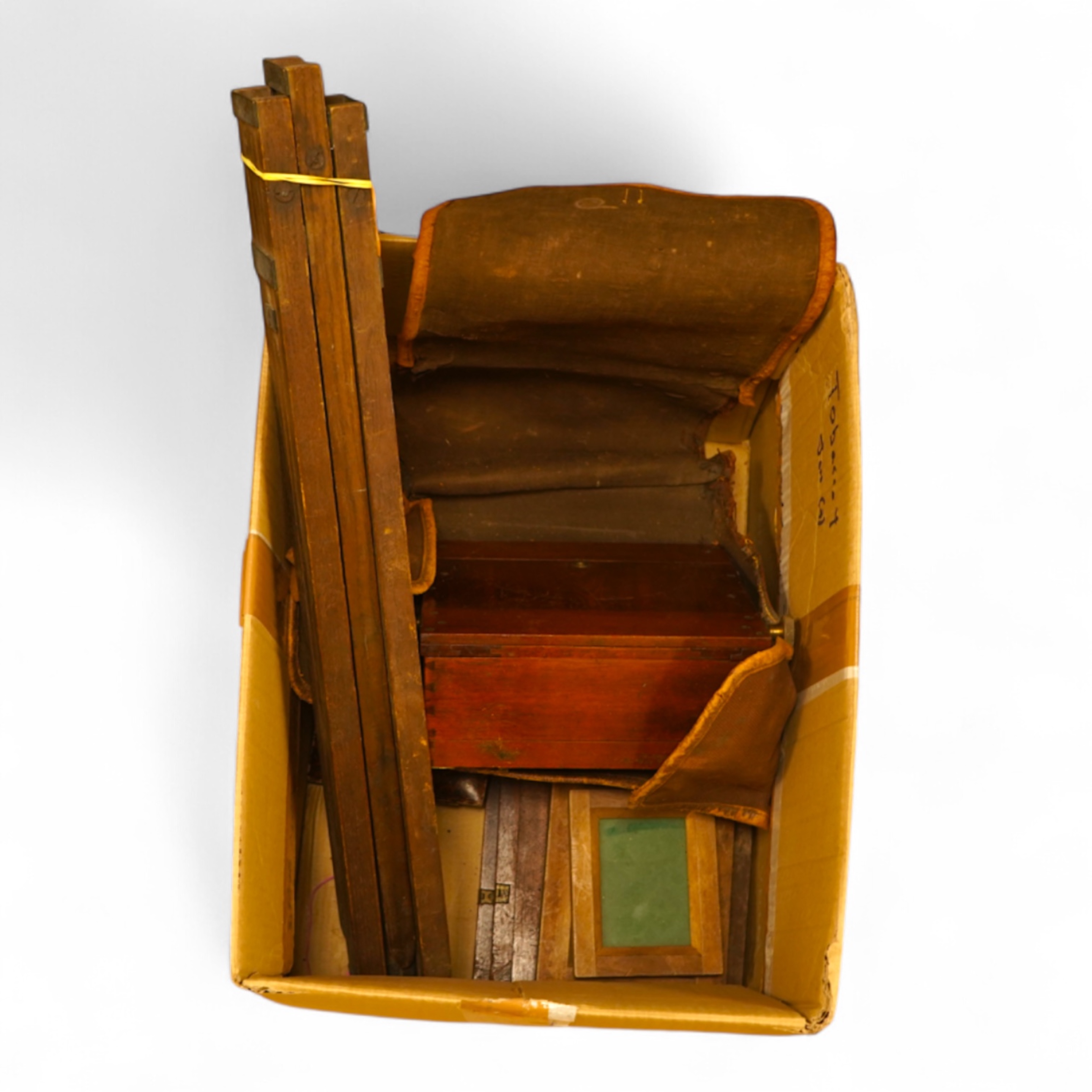 An early 20th century mahogany and brass half plate camera, filters and accessories